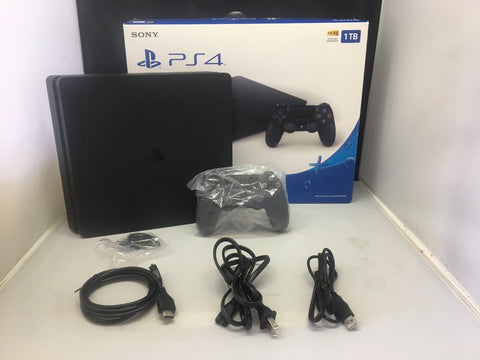 PlayStation 4 Slim 1TB Console with DualShock 4 Wireless Controllers Black - Used Like New